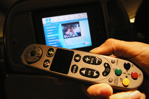 KLM in-flight entertainment screen and remote control