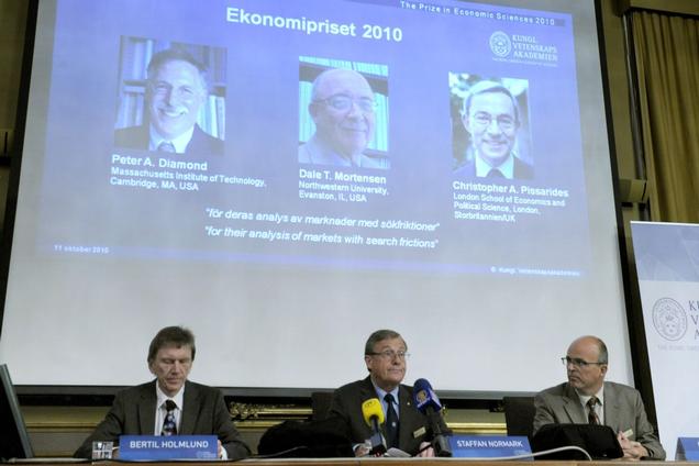 Professor Bertil Holmlund (left), Permanent secretary of the Royal Academy of Sciences Staffan Normark (center) and Professor Per Krusell announce the 2010 Nobel Prize in Economic Sciences on Monday October 11th in Stockholm, Sweden.